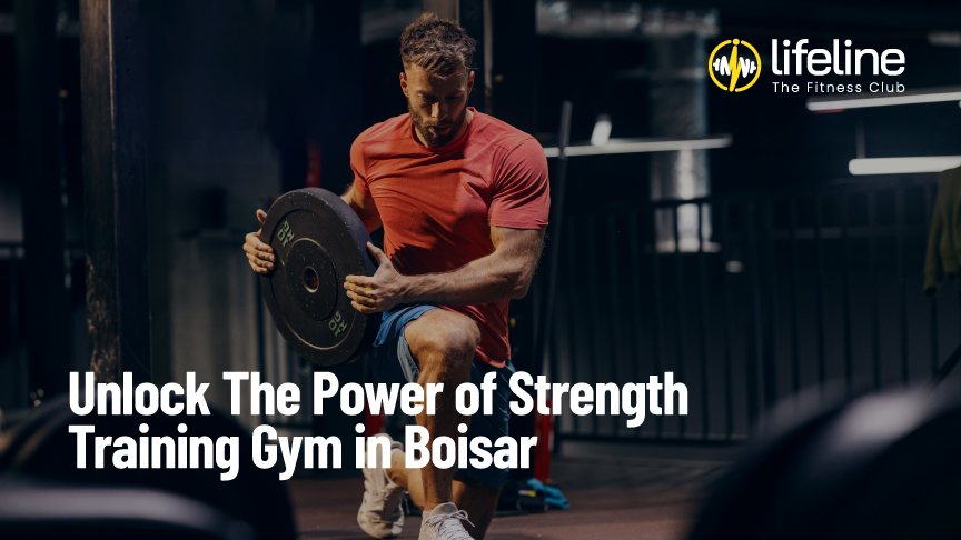 Man performing strength training with weight plate at Lifeline The Fitness Club in Boisar